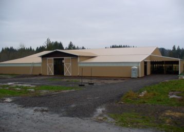 Large horse barn with custom slider doors Large horse barn with custom slider doors
